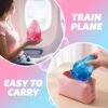 Blue NeeDoh Dream Drop raindrop squish toy resting on its clear splash-shaped stand — Image 5 of 7