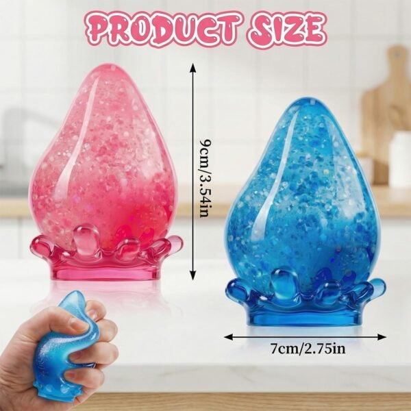 Blue NeeDoh Dream Drop raindrop squish toy resting on its clear splash-shaped stand — Image 7 of 7