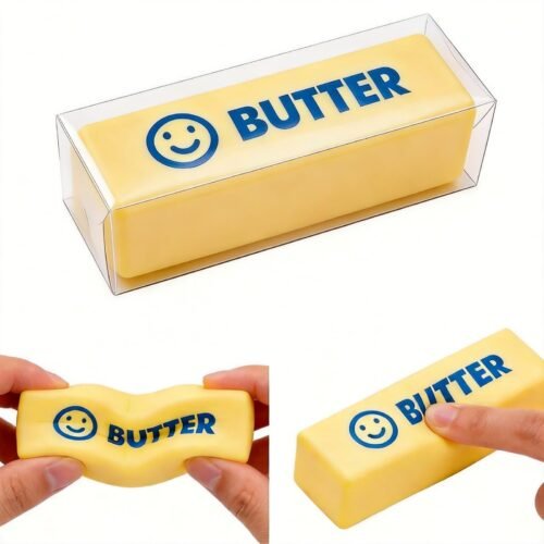 Hand holding a NeeDoh Butter Squishy realistic slow-rise butter stick toy — Image 2 of 11