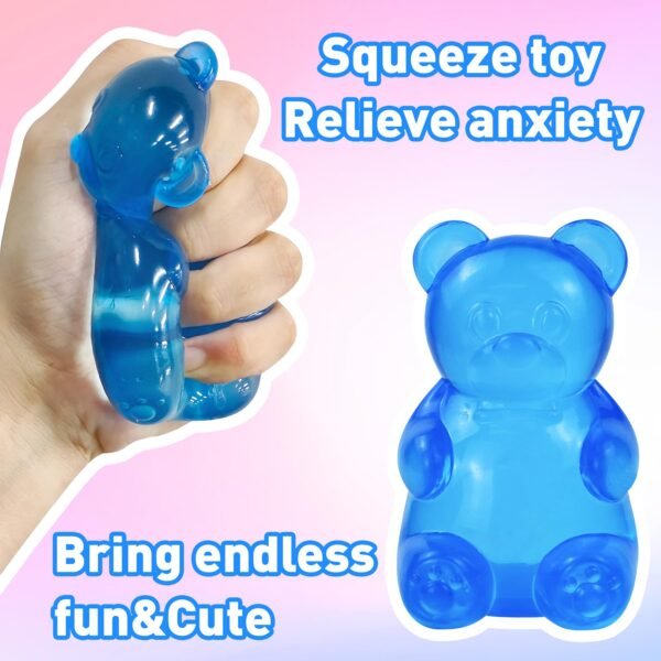 Blue jelly NeeDoh Gummy Bear Taba Squishy being squeezed — Image 5 of 11