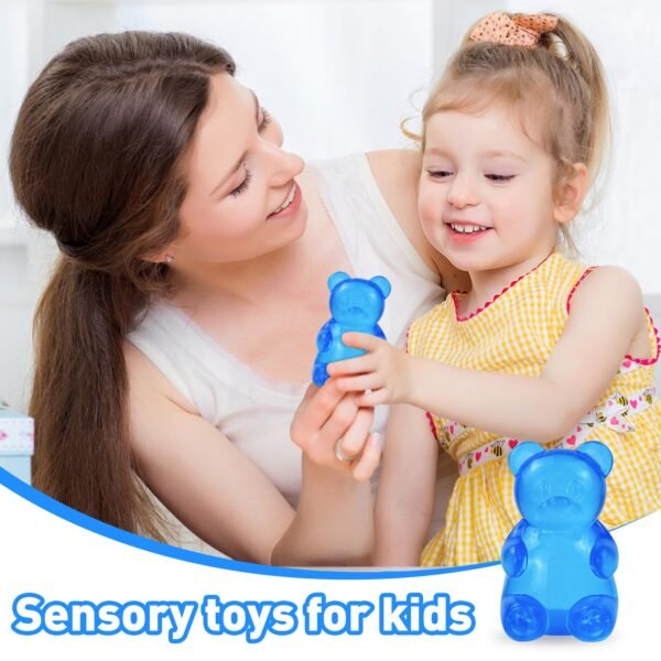 Blue jelly NeeDoh Gummy Bear Taba Squishy being squeezed — Image 7 of 11