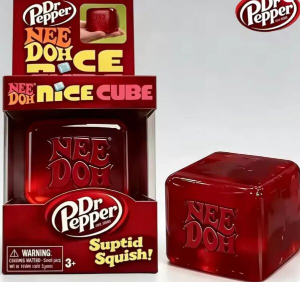 Red translucent NeeDoh Dr. Pepper Nice Cube sensory fidget toy — Image 1 of 1