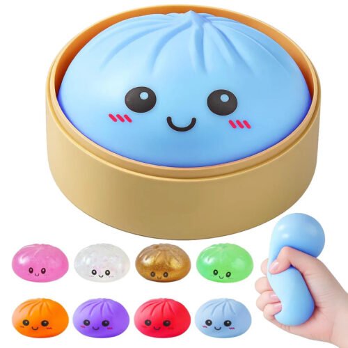 NeeDoh mystery bao bun squishy inside a miniature bamboo-style steamer basket — Image 1 of 1