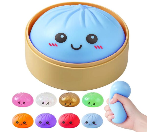 NeeDoh mystery bao bun squishy inside a miniature bamboo-style steamer basket — Image 1 of 1