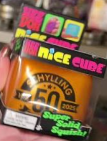 Golden NeeDoh Nice Cube collector's edition shown inside its display box — Image 1 of 1