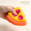 NeeDoh Pizza Squeezza pizza slice fidget toy with removable cheese and pepperoni toppings — Image 2 of 9